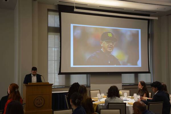 Paul Jacobs pays tribute to Lou Holtz during a Dinner & Dialogue event
